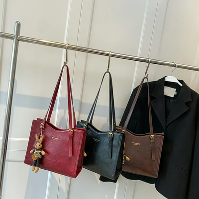 CHARMTOTE™ | Axelväska